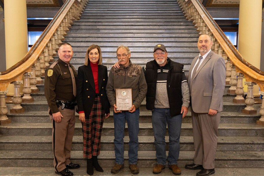 Photo of Michael Edwards accepting his award